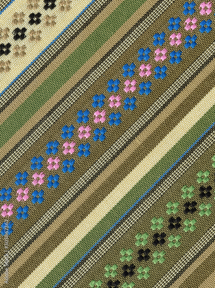 Close-up texture in ethnic style with multicolour details Close-up texture in ethnic style with multicolour details
