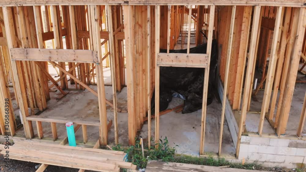 Home Framing unfinished wood building or a house under construction Home Framing unfinished wood building or a house under construction