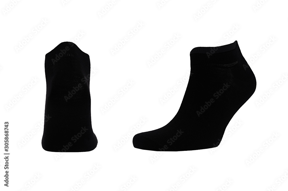 Blank black cotton sport short socks on invisible foot isolated on white background as mock up for advertising, branding, design, back and side view, template. Blank black cotton sport short socks on invisible foot isolated on white background as mock up for advertising, branding, design, back and side view, template.