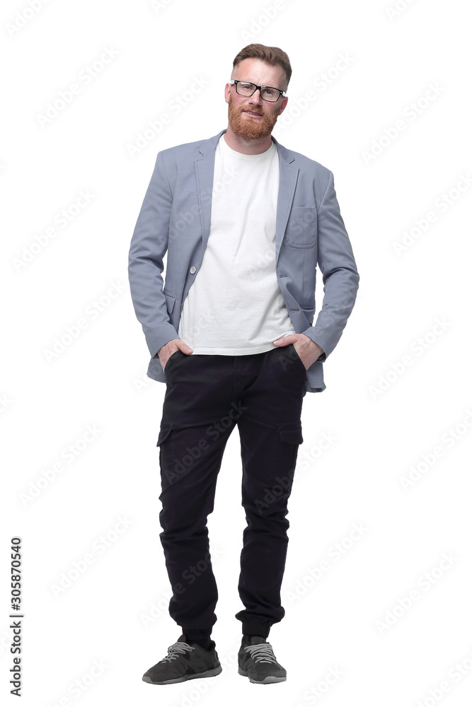 confident business man with hands in pockets . isolated on white confident business man with hands in pockets . isolated on white