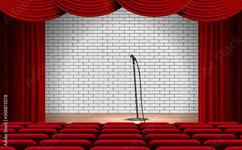 microphone and red curtain on the wooden stage in the hall