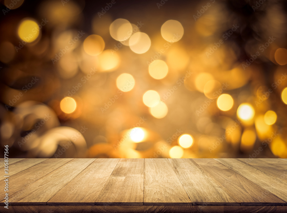 Wood texture table top (counter bar) with blur light gold bokeh in cafe,restaurant background