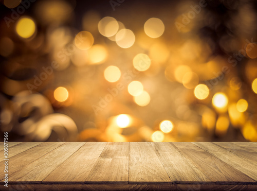 Wood texture table top (counter bar) with blur light gold bokeh in cafe,restaurant background