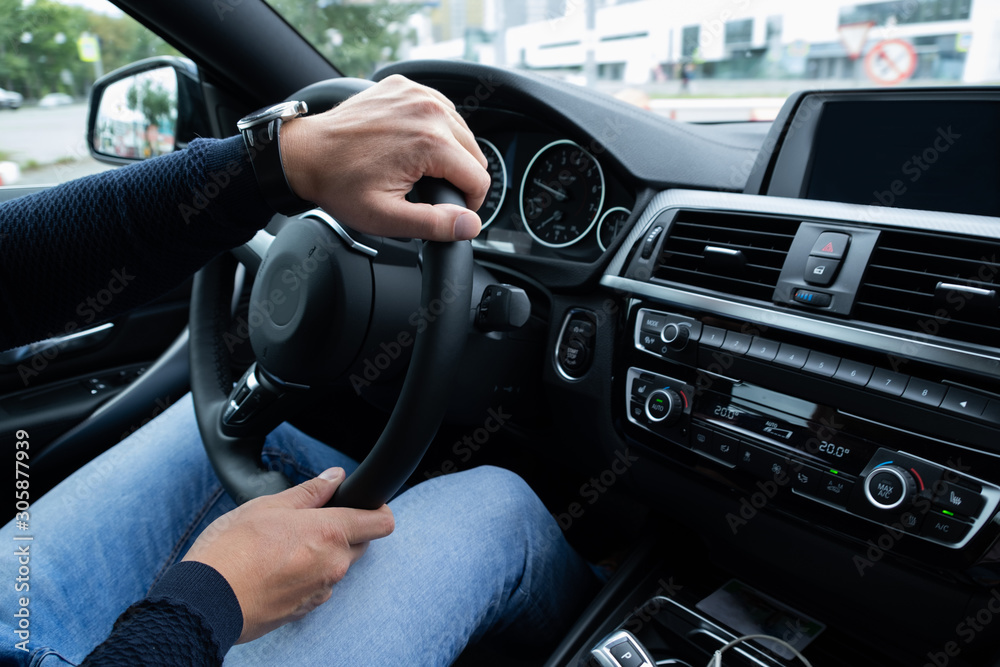 Man driving a business class car Man driving a business class car