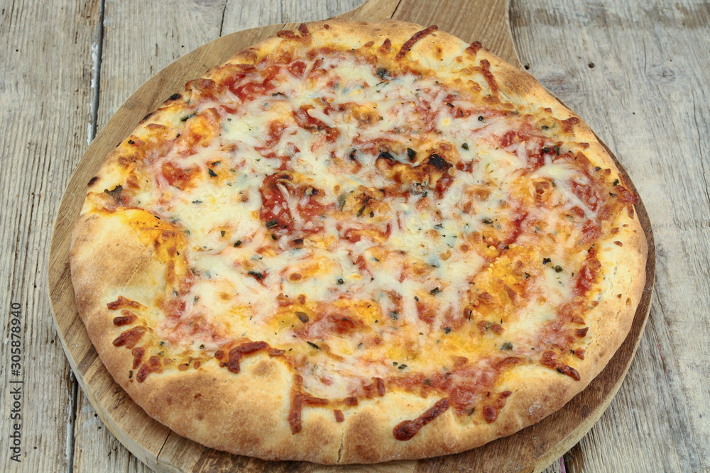 pizza on the wood table pizza on the wood table