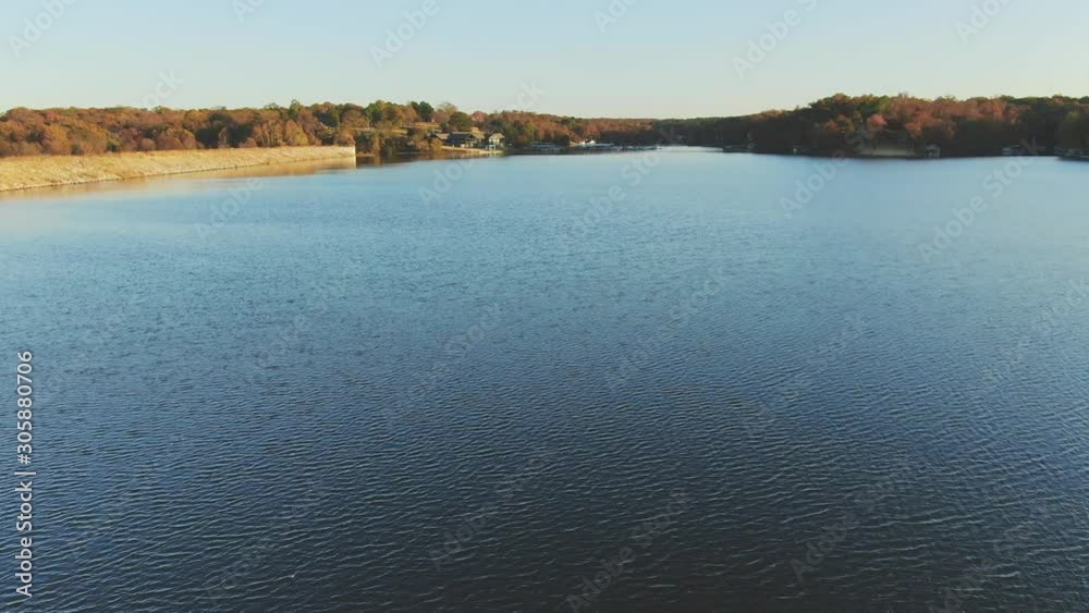low altitude aerial view of just above lake surface low altitude aerial view of just above lake surface
