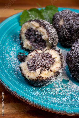 sweet dumplings with poppy seeds and icing sugar