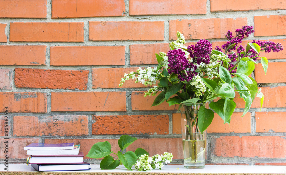 Naklejka premium Beautiful floral syringa pattern. Brick wall background. Wedding invitation or Mother's Day brick background, empty space surrounded with flowers