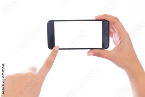 Smartphone with a blank white screen. New popular smartphone in hand on white background