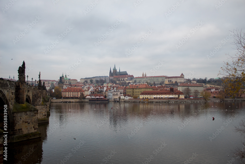  A masterpiece of architecture the famous Charles Bridge in the city of Prague, Czech Republic, on a cloudy morning on the eve of Christmas.
