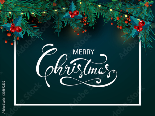 Calligraphy of Merry Christmas with pine leaves  red berries and lighting garland decorated on green background. Can be used as greeting card design.