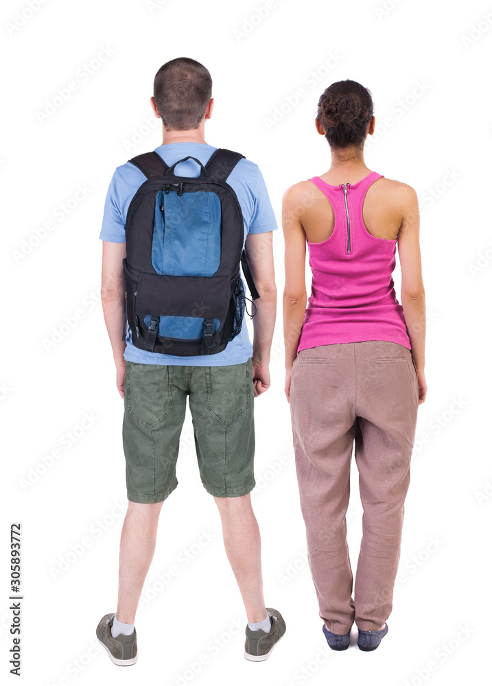Back view of couple. beautiful friendly girl and guy together. Back view of couple. beautiful friendly girl and guy together.