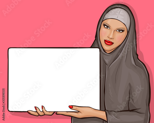 Arabic woman in hijab holds white poster. Muslim girl in traditional clothes showing blank square placard. Vector pop art illustration with copy space on billboard