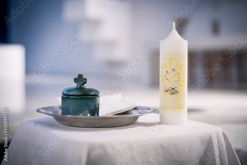 Canvas Print Close up on ceramic jar containing Holy Spirit oil before baptism ceremony