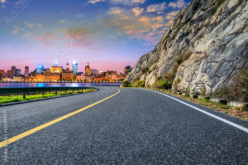 Photography Night asphalt road and city skyline in Shanghai