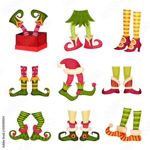 Christmas Elf Feet. Dwarf Legs Wearing Funny Striped Socks and Boots