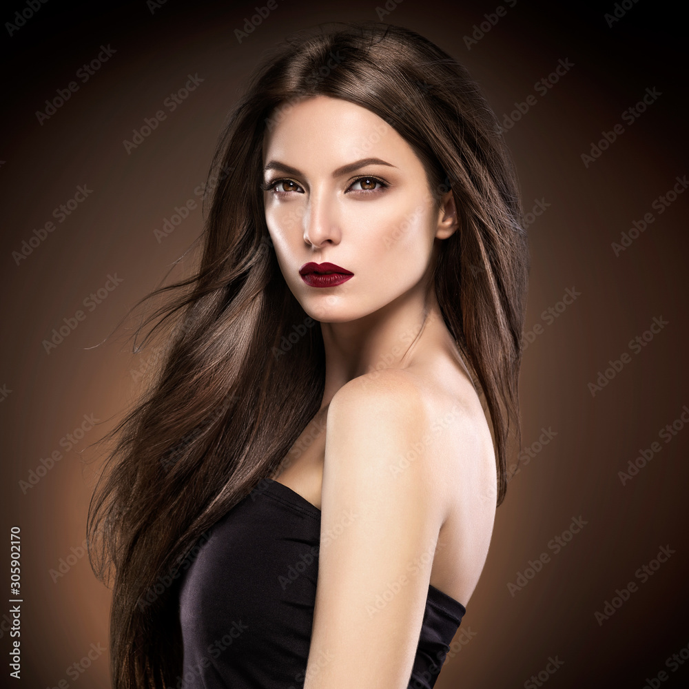 Beautiful hair woman long smooth hairstyle red lipstick brown backrgound Beautiful hair woman long smooth hairstyle red lipstick brown backrgound