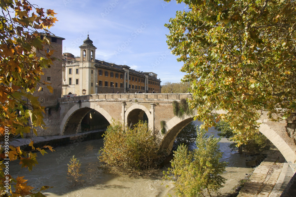 river with bridge in rome