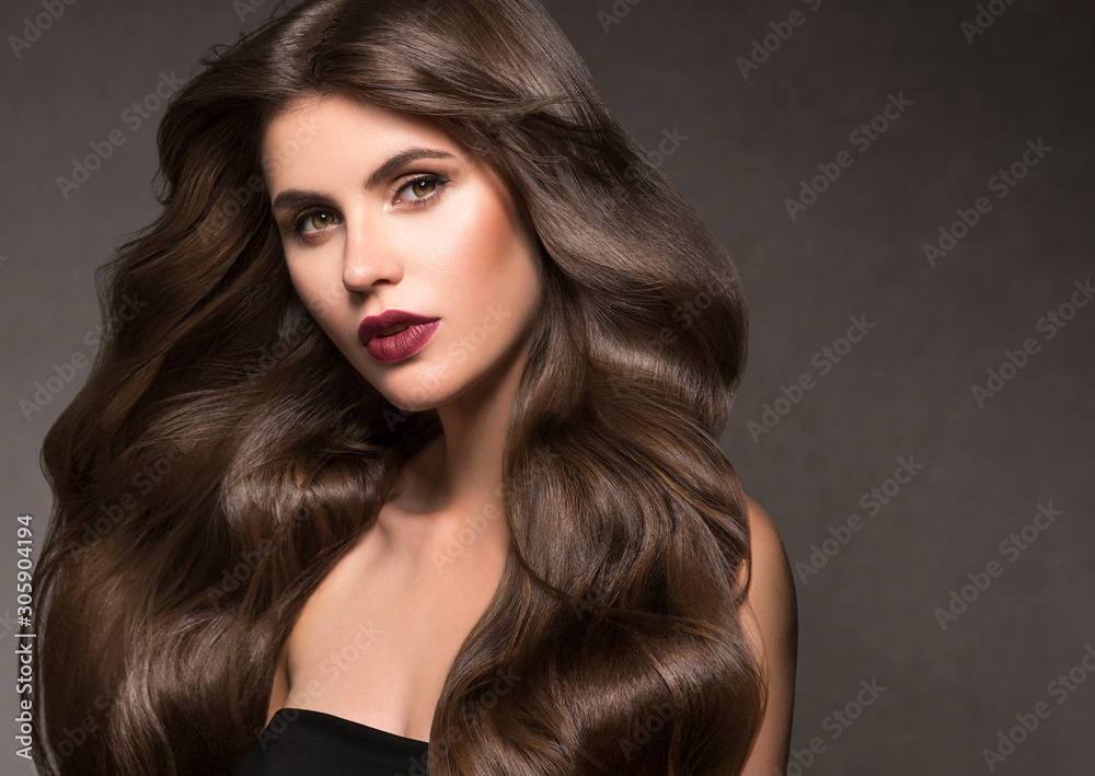 Beautiful brunette hair woman long curly hairstyle natural makeup Beautiful brunette hair woman long curly hairstyle natural makeup