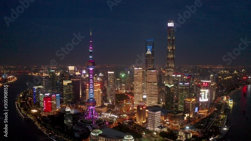 Wallpaper Mural Shanghai Lujiazui business district Aerial with drone scene pan shot motion movement to central of city in night time Torontodigital.ca