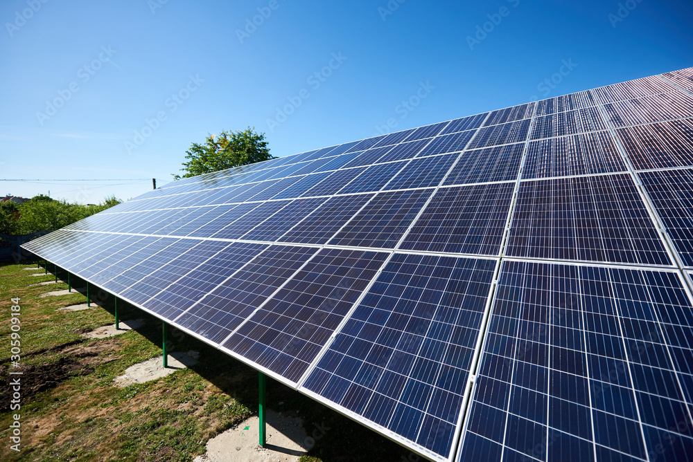 Innovative solar panels mounted on building's facade. new modern technology using renewable solar energy, saving natural, ecological resources. Environment friendly. Smart exterior building. Innovative solar panels mounted on building's facade. new modern technology using renewable solar energy, saving natural, ecological resources. Environment friendly. Smart exterior building.