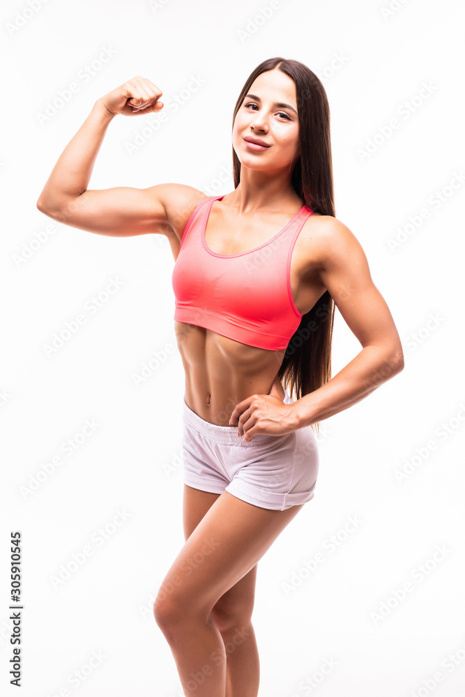 Portrait of a beautiful fitness woman showing her biceps isolated on white background Portrait of a beautiful fitness woman showing her biceps isolated on white background