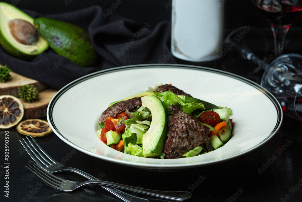 beef salad with avocado, tomato, lettuce and carrot beef salad with avocado, tomato, lettuce and carrot