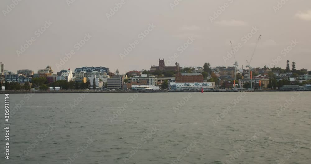 Grey, cloudy afternoon sky at Stockton, overlooking the Newcastle Harbor, New South Wales, Australia Grey, cloudy afternoon sky at Stockton, overlooking the Newcastle Harbor, New South Wales, Australia