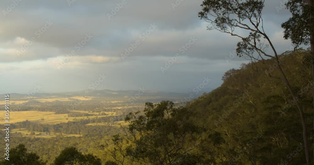 View of the sun shining over The Hunter Valley, Watagans State Park, New South Wales, Australia View of the sun shining over The Hunter Valley, Watagans State Park, New South Wales, Australia