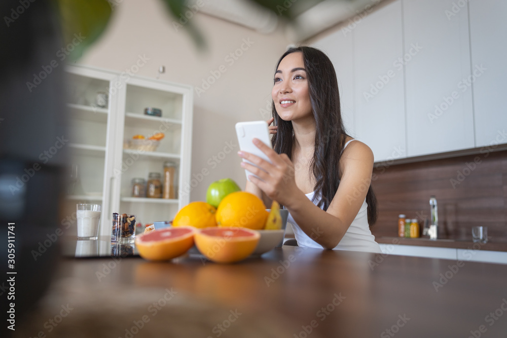 Girl sitting in front of the fruit bowl Girl sitting in front of the fruit bowl