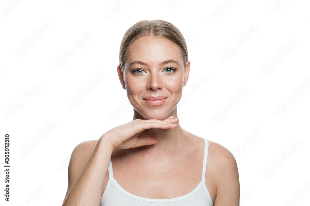 Natural beauty. Real woman face with healthy skin isolated on white Natural beauty. Real woman face with healthy skin isolated on white
