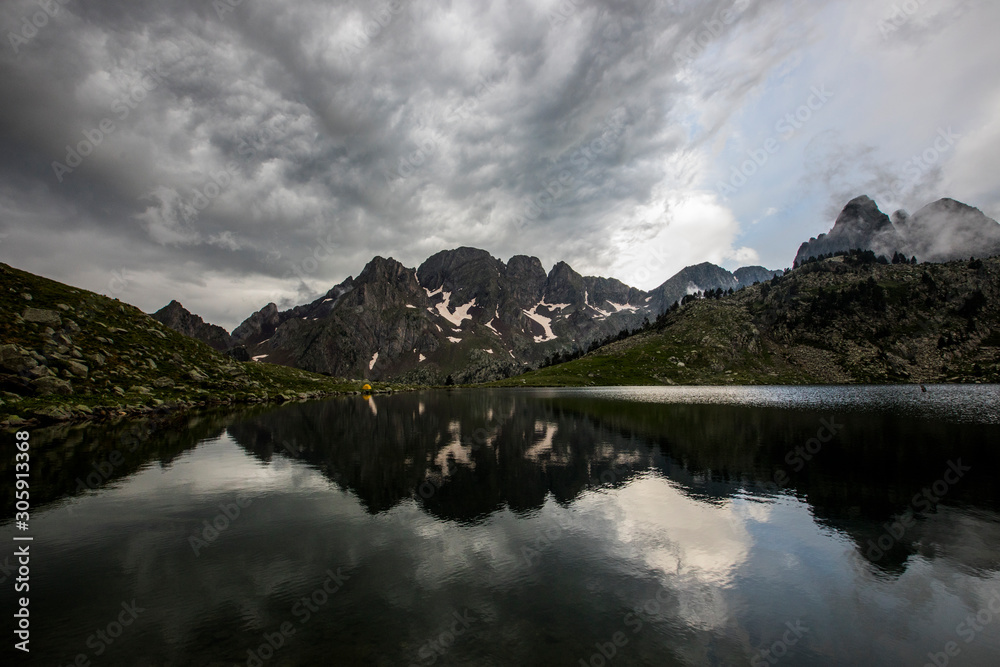 Sunset in Ibon Grande de Batisielles, Posets Maladeta Nature Park, Aragon Pyrenees, Spain Sunset in Ibon Grande de Batisielles, Posets Maladeta Nature Park, Aragon Pyrenees, Spain
