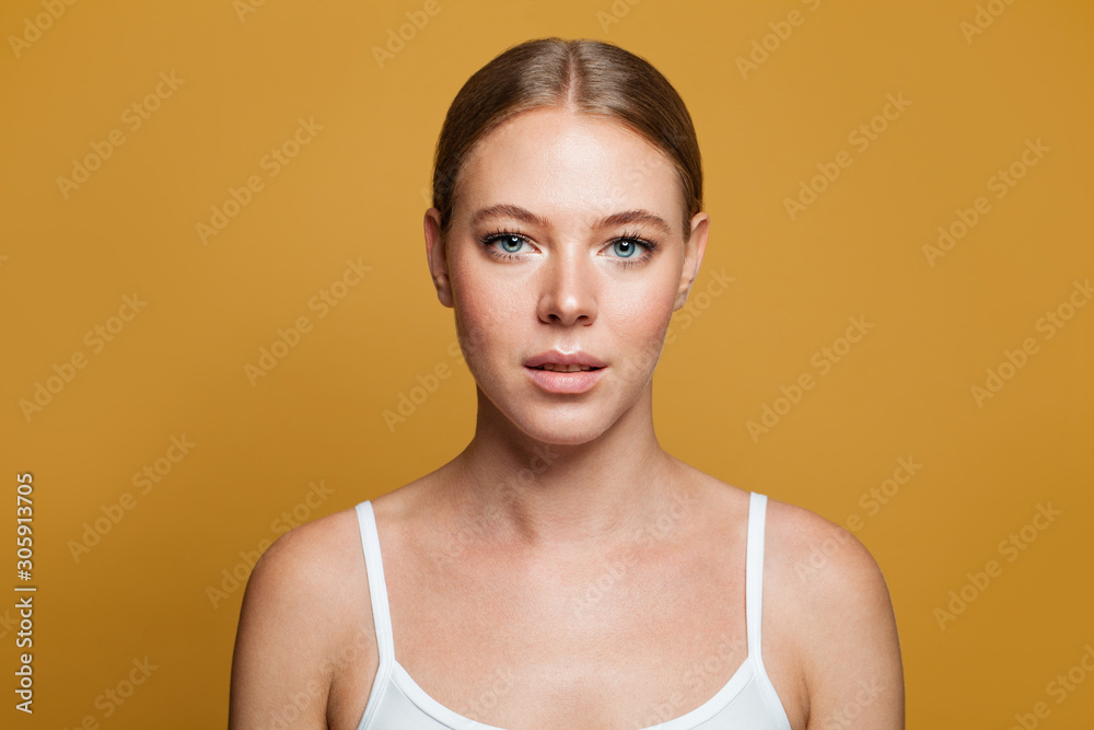 Young model woman on yellow background Young model woman on yellow background