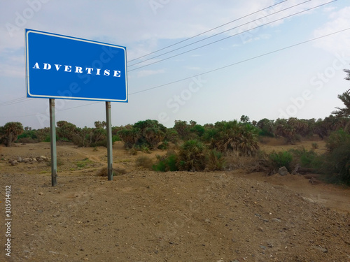 blank Blue Road traffic sign with empty copy space in the blue sky 