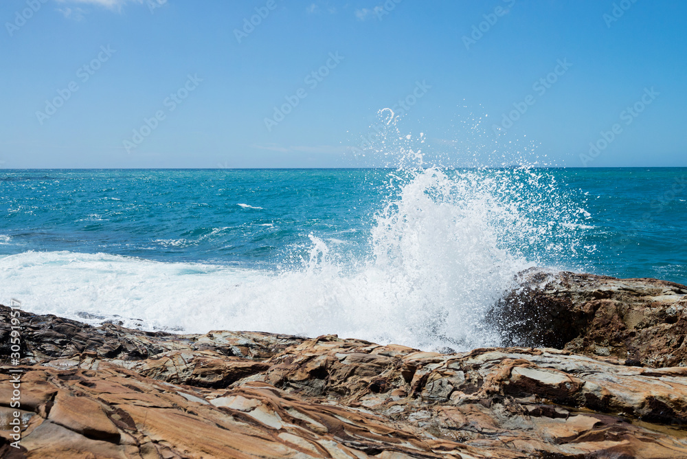 Beautiful azure sea and the rocky beach