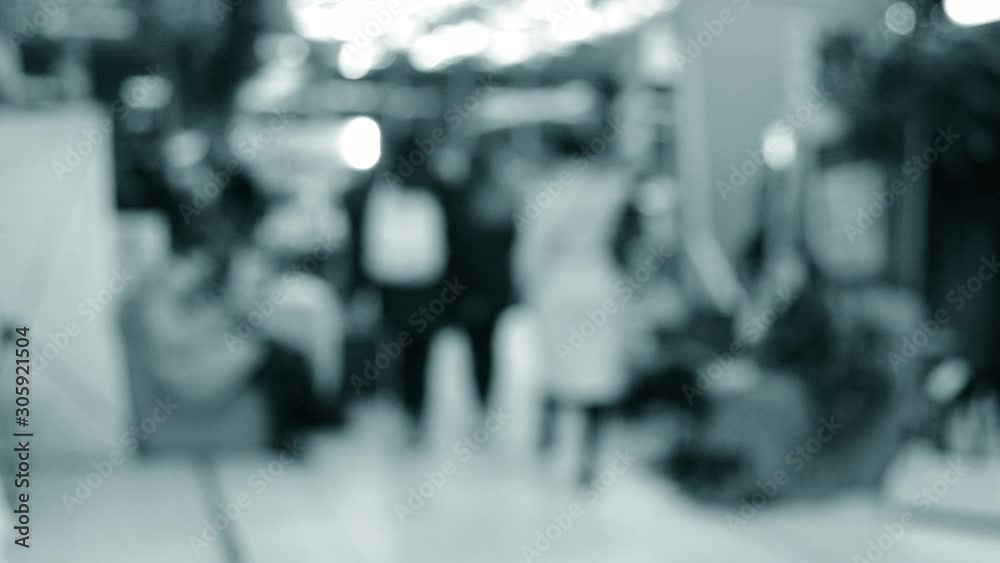 Crowd lot of people in mall. Blurred Abstract Background. Blurred View Crowd lot of people in mall. Blurred Abstract Background. Blurred View