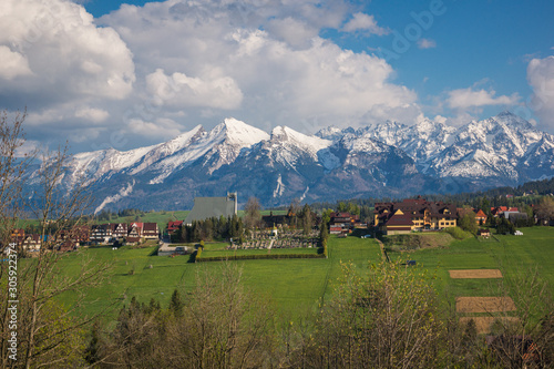 Fototapeta Naklejka Na Ścianę i Meble -  Panorama of snowy Tatra mountains and Podhale village Bukowina Tatrzanska, Malopolskie, Poland