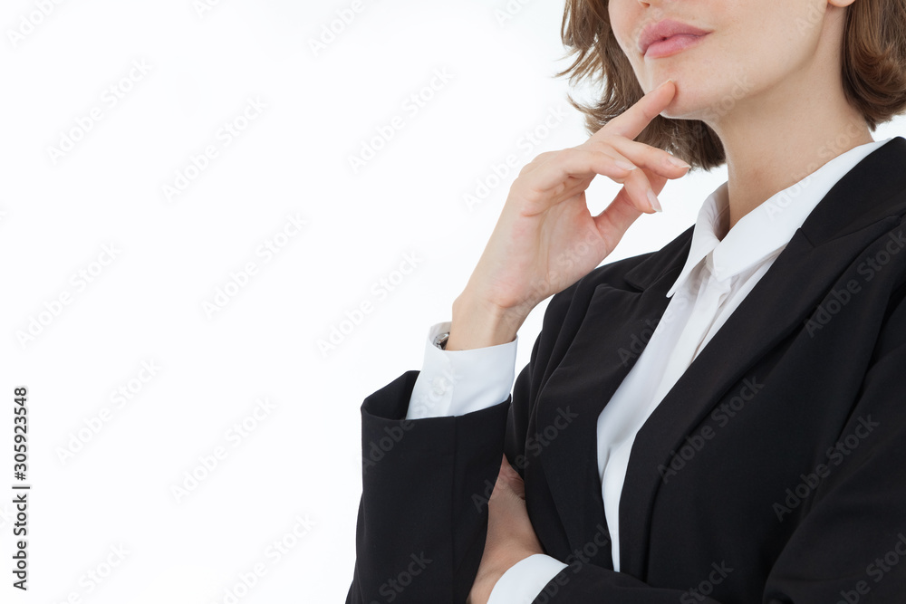 A beautiful woman in a suit is thinking with a happy face on a white background in the concept of business success and career progress. A beautiful woman in a suit is thinking with a happy face on a white background in the concept of business success and career progress.