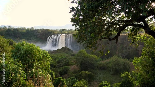 The evening sun shines over Blue Nile Falls, Ethiopia photo