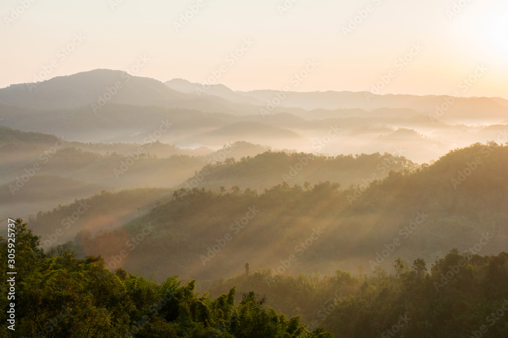 A picture of beautiful sky and cover foggy of layer mountain before sunrise, Thailand. A picture of beautiful sky and cover foggy of layer mountain before sunrise, Thailand.