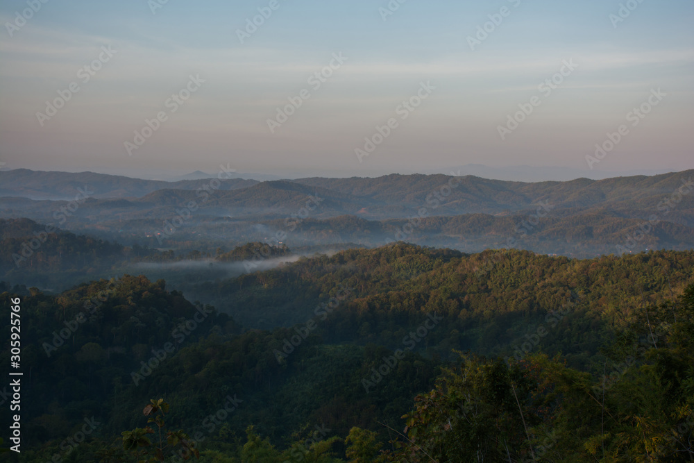 A picture of beautiful sky and cover foggy of layer mountain before sunrise, Thailand.