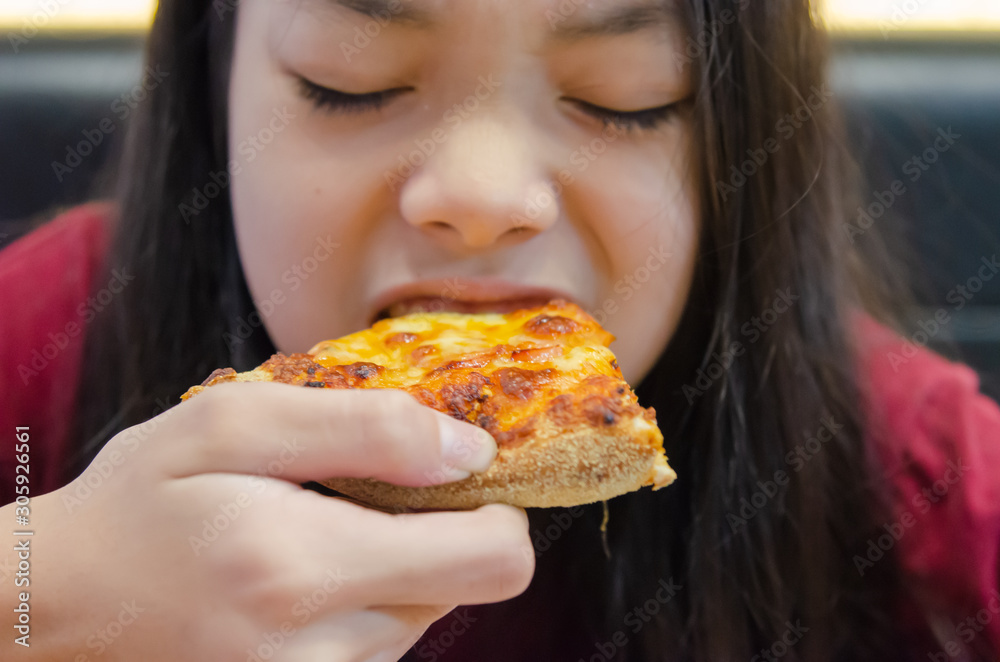 Child eating pizza Child eating pizza