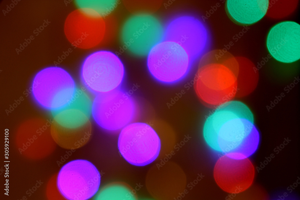 Colorful bokeh lights on black background On christmas day. Colorful bokeh lights on black background On christmas day.