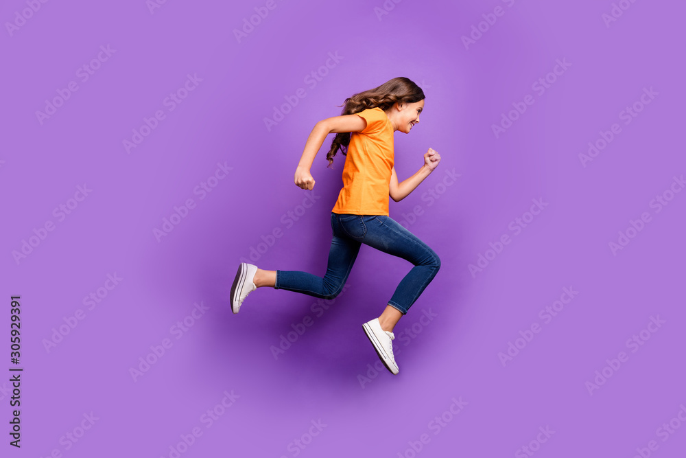 Full length body size view of her she nice attractive lovely funky cheerful cheery wavy-haired girl jumping running fast action isolated over lilac purple violet pastel color background