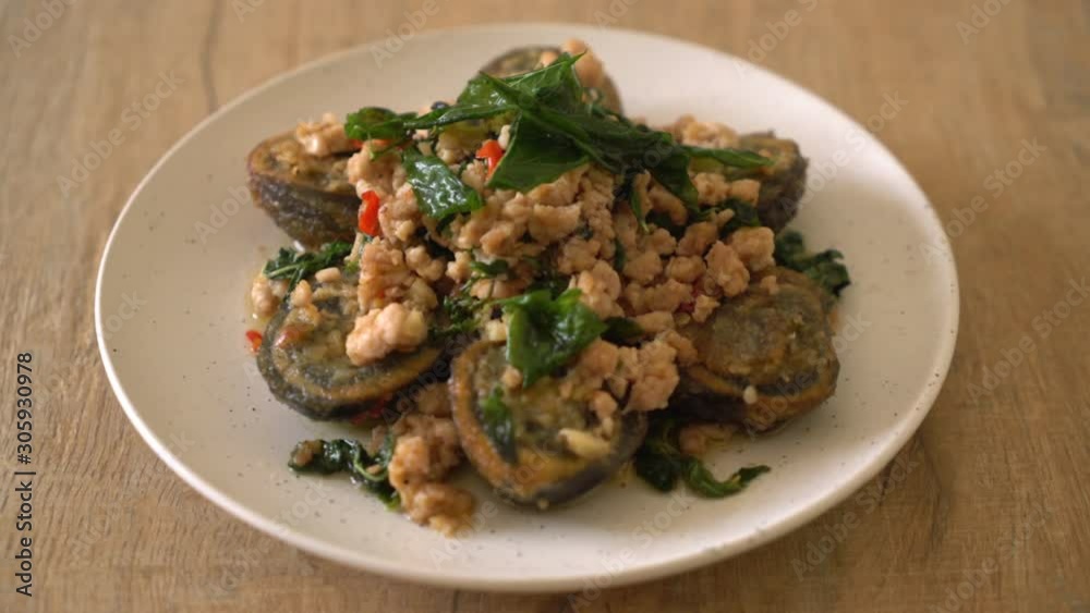 Stir-fried Century Egg and Minced Pork with Holy Basil Leaves Stir-fried Century Egg and Minced Pork with Holy Basil Leaves