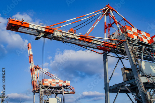 Wallpaper Mural Cranes in the port for unloading cargo from ships.  Torontodigital.ca
