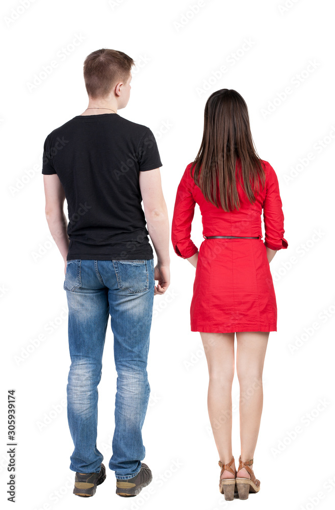 Back view of couple. beautiful friendly girl and guy together. Back view of couple. beautiful friendly girl and guy together.