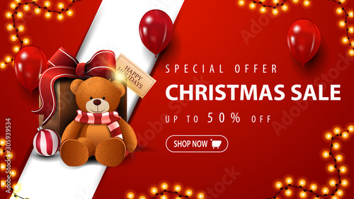 Special offer, Christmas sale, up to 50% off, red discount banner with garland, red balloons and present with Teddy bear