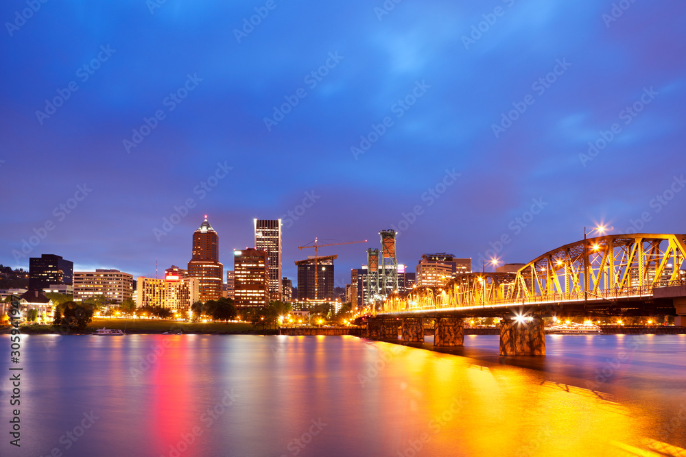 Skyline of Portland, Oregon across the Willamette River, at night