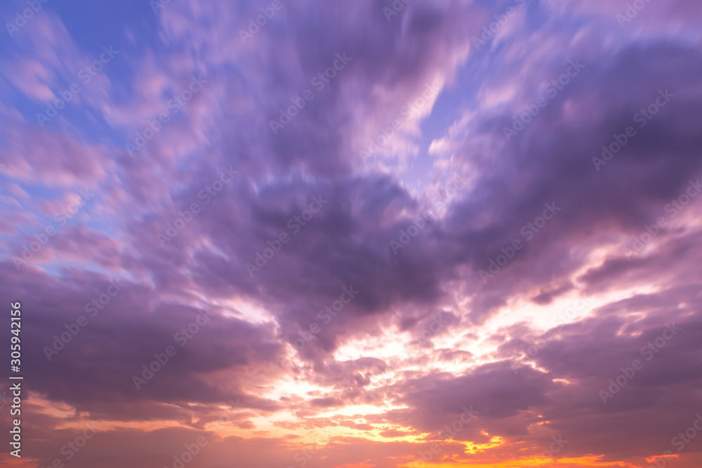 blue bright and orange yellow dramatic sunset sky in countryside texture background.